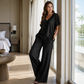 Conjunto casual feminino de blusa com decote em V e calças de perna larga